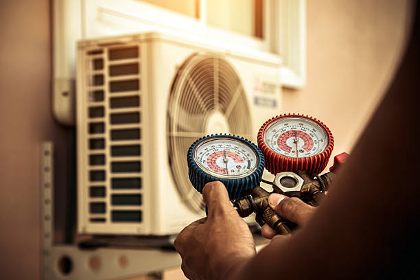 Professional Ac Repair technician working in Russell, KS